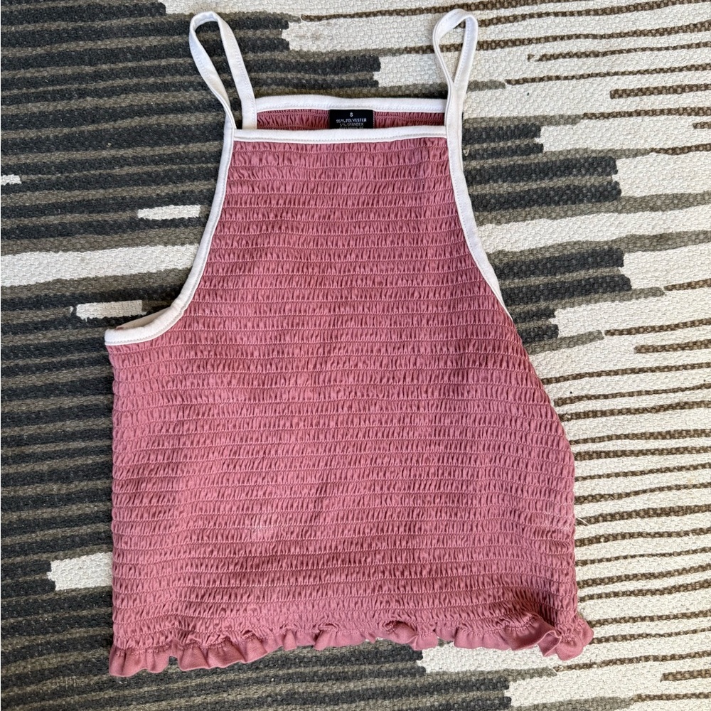 Pink smocked halter crop top with white straps